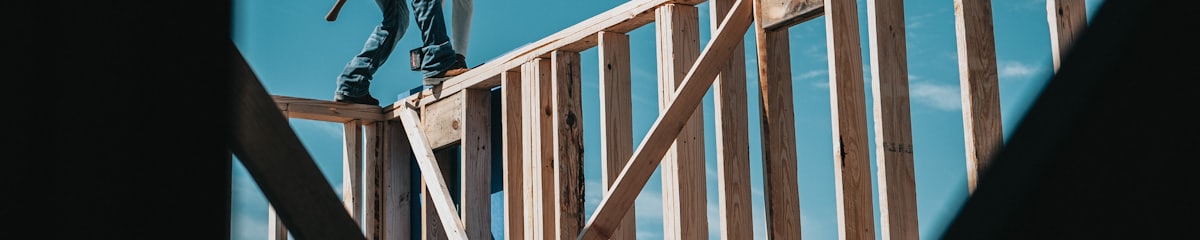 Construction worker framing a new house